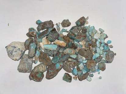 Raw Turquoise Halloran Springs Mined 4lbs: Discover a rare opportunity to own a raw turquoise specimen directly mined from the renowned Halloran Springs. This uncut gem boasts a captivating interplay of deep blues and vibrant greens, highlight