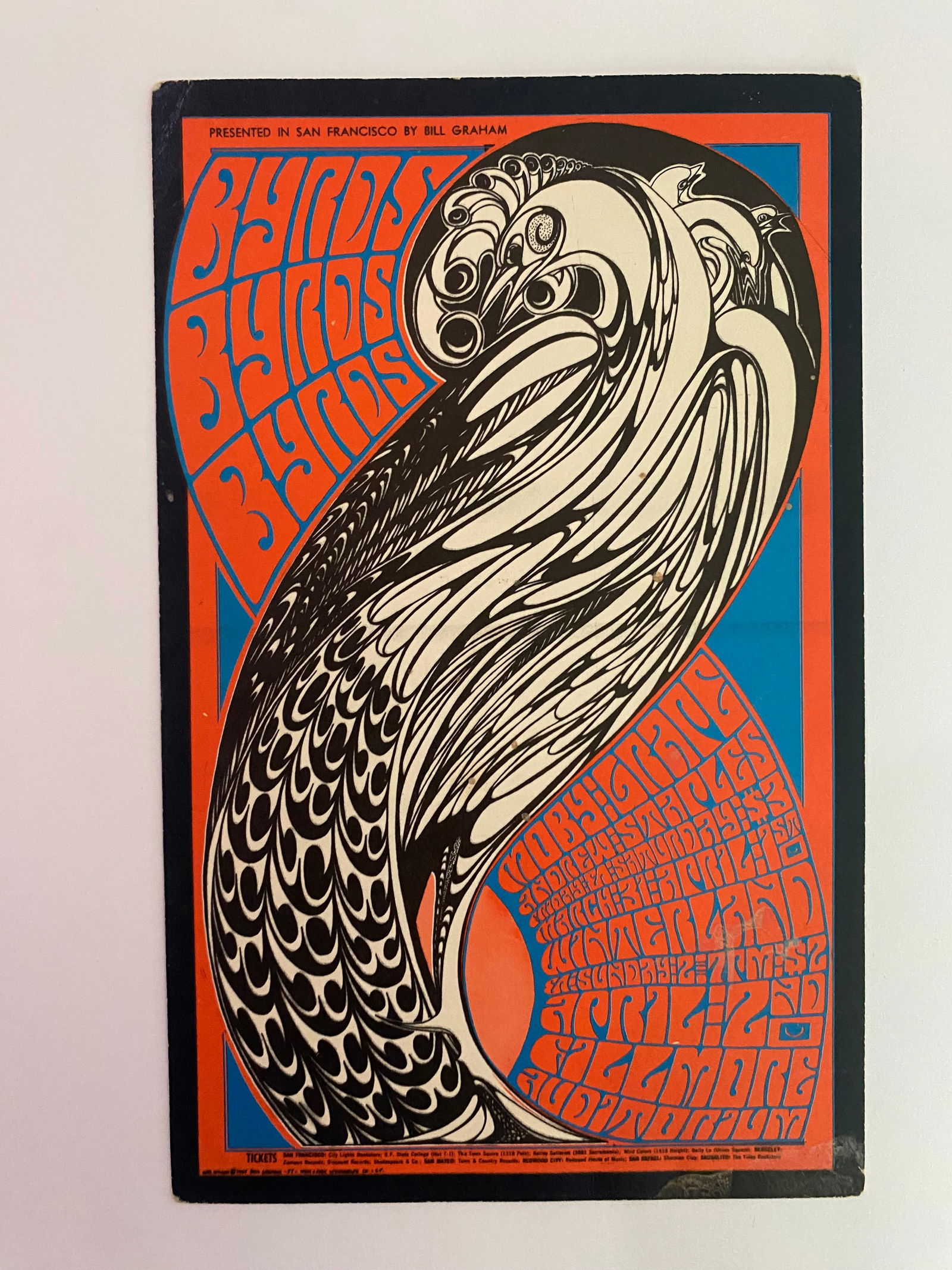 The Byrds Moby Grape 1967 Fillmore Concert Postcard 2nd Printing: Offered here is an original 2nd printing of the 1967 Fillmore Auditorium concert postcard promoting The Byrds and Moby Grape, designed by celebrated artist Wes Wilson. This vibrant piece of psychedeli