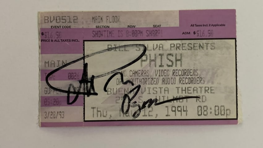 Phish Autograph 1994 Concert Ticket: Offered here is an original 1994 Phish concert ticket boldly autographed by the band, a rare and nostalgic piece from the golden era of the jam scene. Signed during the peak of Phish’s early touring