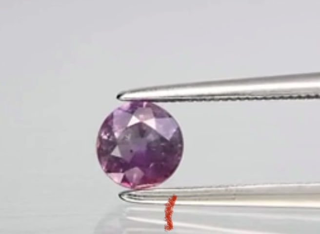 0.71ct Round Purple Sapphire: 0.71ct 5mm Round Purple Sapphire from Madagascar