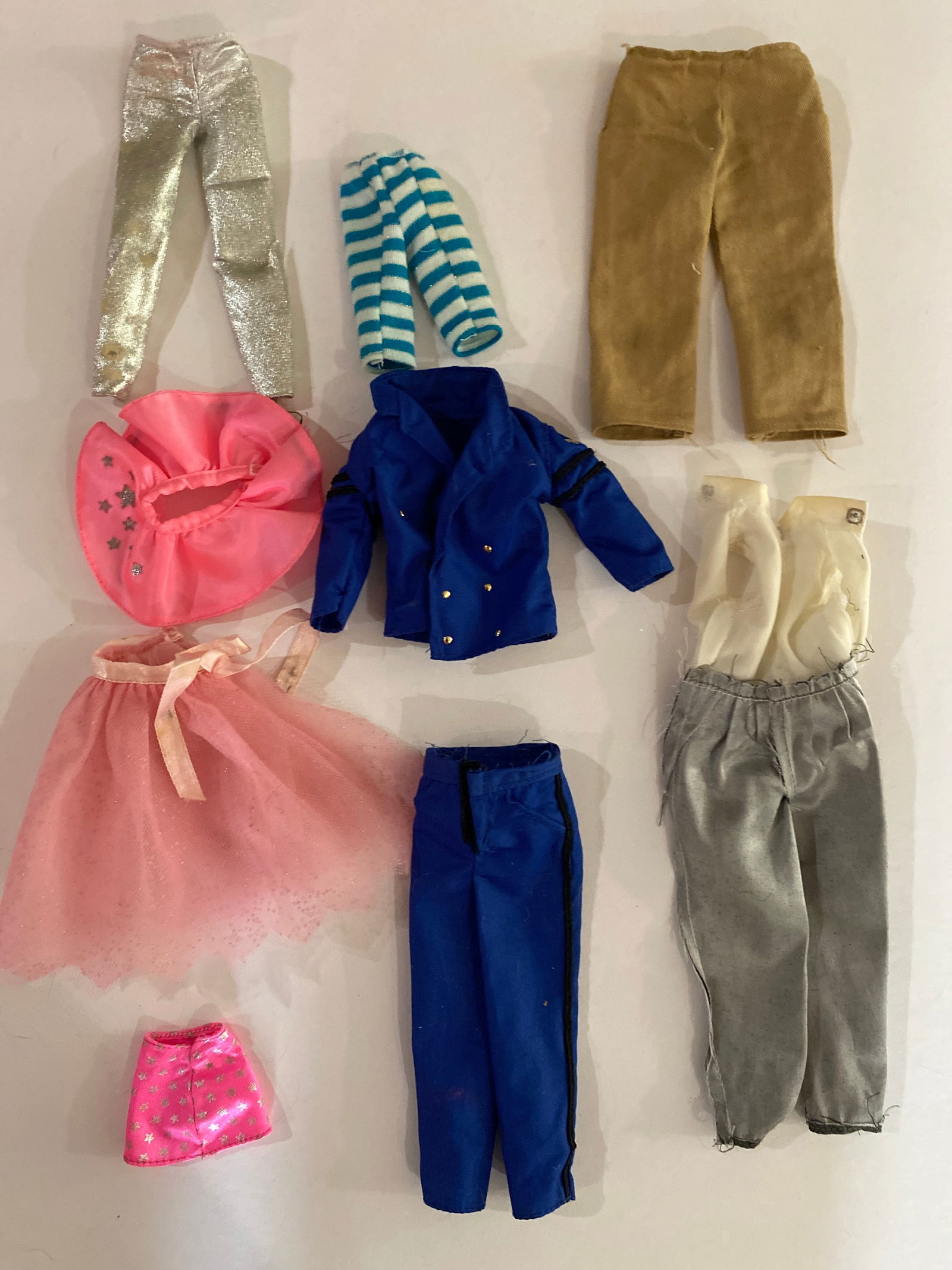 Vintage Barbie Doll Clothes Outfit Lot: Group lot of vintage Barbie doll clothing and outfits. Original Barbie fashion pieces were produced by Mattel across numerous themed wardrobe sets and are widely collected for their connection to