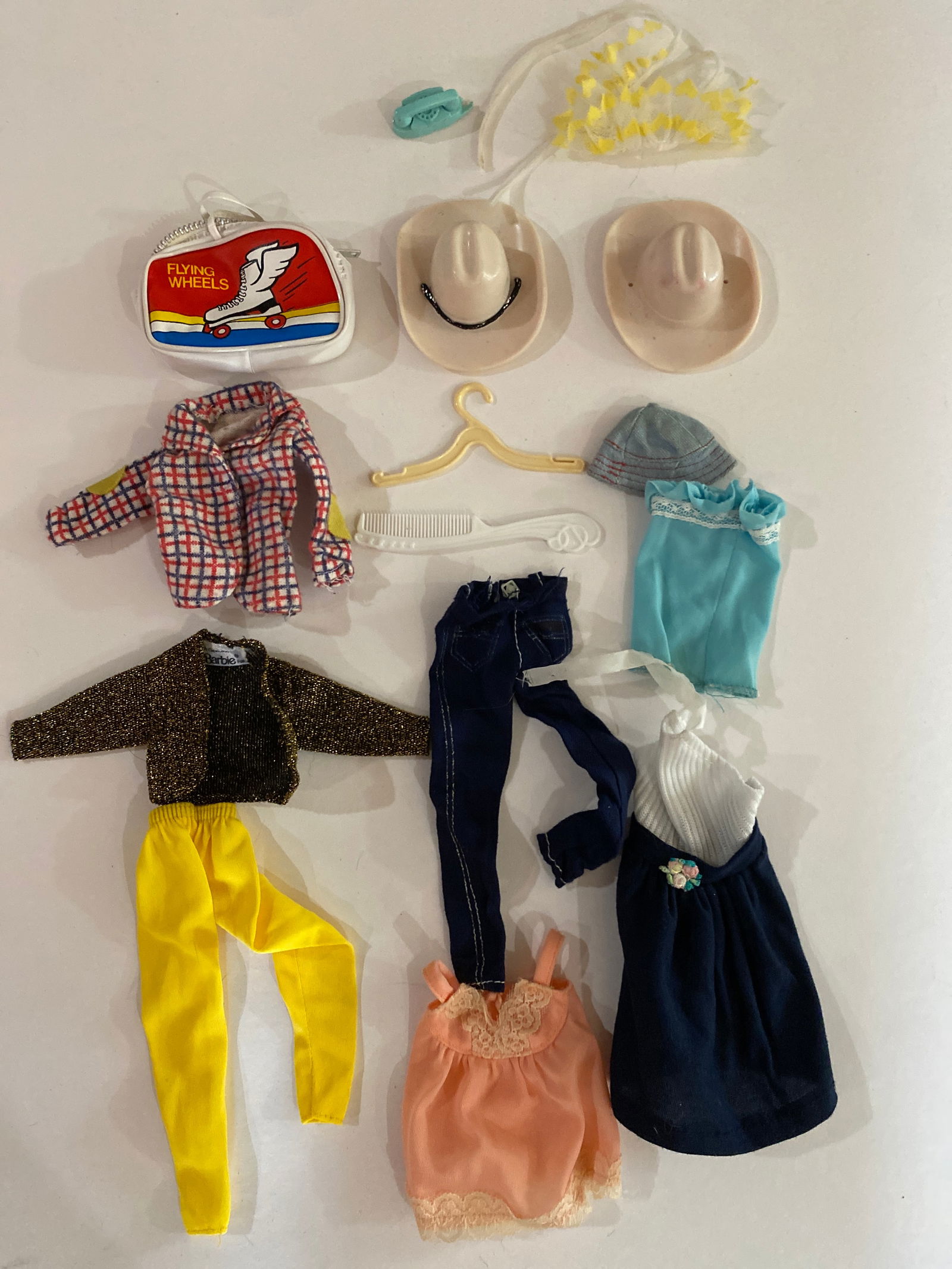 Vintage Barbie Doll Clothes and Accessories: This lot features a selection of vintage Barbie doll clothes and accessories made for Mattel Barbie fashion dolls. Since Barbie’s introduction in 1959, Mattel produced a wide variety of outfits,