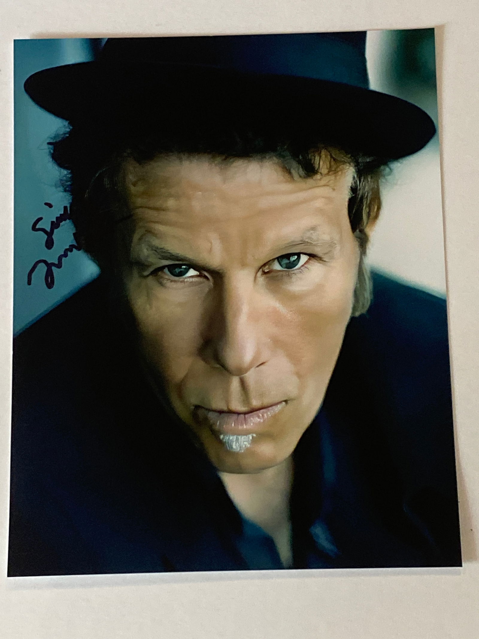 Tom Waits Autogrpahed Photo: Autographed photo of Tom Waits, the singer-songwriter, actor, and composer known for his distinctive voice and albums spanning folk, blues, jazz, and experimental rock. Waits has long had a dedicated