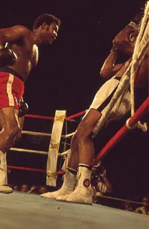 Original Muhammad Neil Leifer Photo Negative: Original vintage photographic slide negative by legendary sports photographer Neil Leifer capturing heavyweight champion Muhammad Ali executing his famed “rope-a-dope” strategy against George