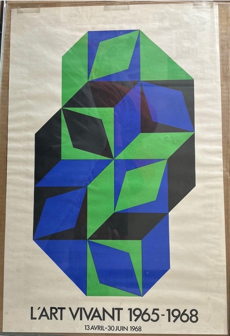 Victor Vasarely 1968 Vivant Poster: This Victor Vasarely 1968 Vivant poster features the work of the pioneering Op Art artist known for his geometric abstractions and exploration of visual perception. Produced during a period when