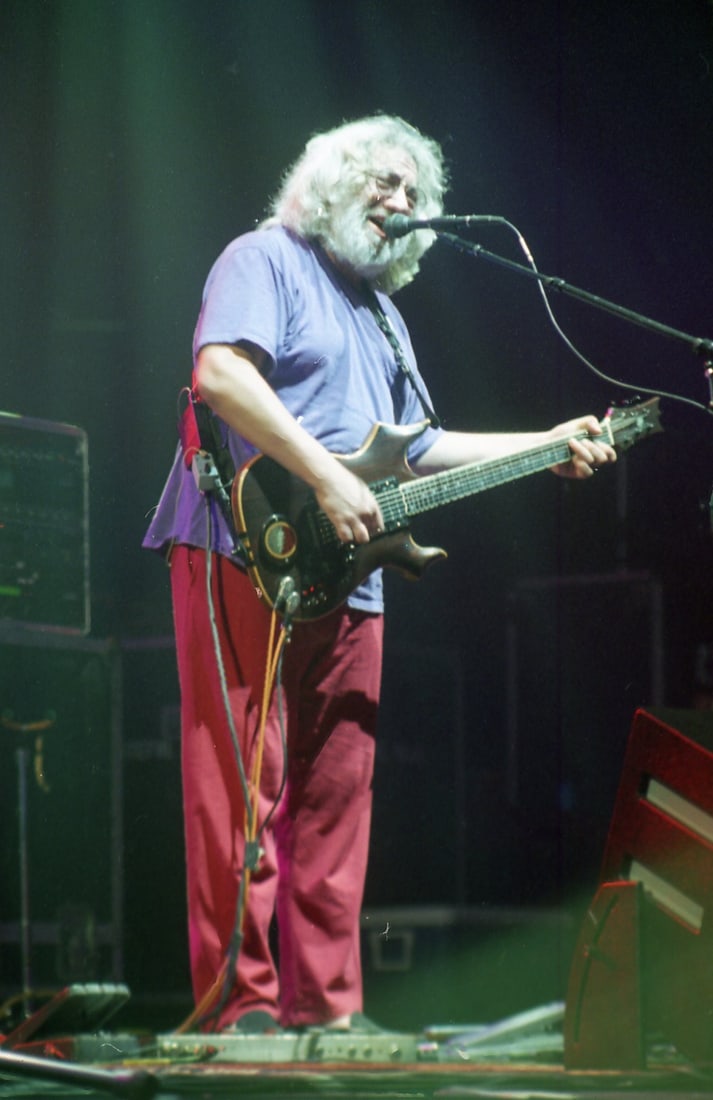 Jerry Garcia Grateful Dead Ebet Roberts Photo Negative: This lot features an original photographic negative of Jerry Garcia, taken by Ebet Roberts during a live performance with the Grateful Dead at RFK Stadium in Washington, D.C. in 1995. The image shows