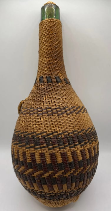 Pima Tribe Native American 19th Century Woven Bottle Basket: A superb example of Akimel O'odham (Pima) artistry, this coiled basket showcases the intricate craftsmanship and geometric precision for which the tribe is renowned. Hand-woven using traditional mater