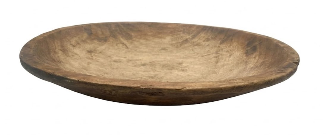 Hand Turned Walnut Bowl circa 1910: Hand-turned walnut bowl dating to circa 1910, showcasing traditional woodworking craftsmanship and natural wood grain character. Measures 4 inches high with a 24.25 inch diameter.