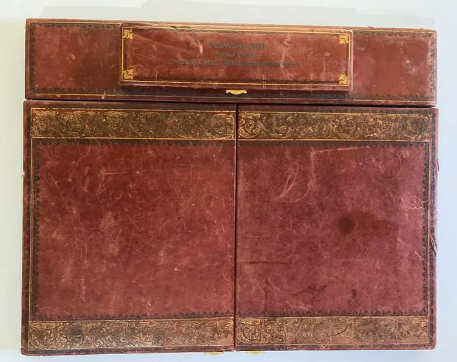 Pawnee Bill Owned Portble Leather Desk: Portable leather desk owned by Pawnee Bill, reflecting personal use and connection to the historic Wild West show figure.