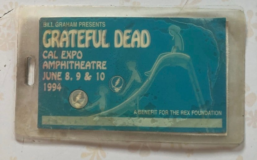 Grateful Dead 1994 Cal Expo Crew Backstage Pass: Signed photograph featuring Phil Lesh and Bob Weir, key members of the Grateful Dead.