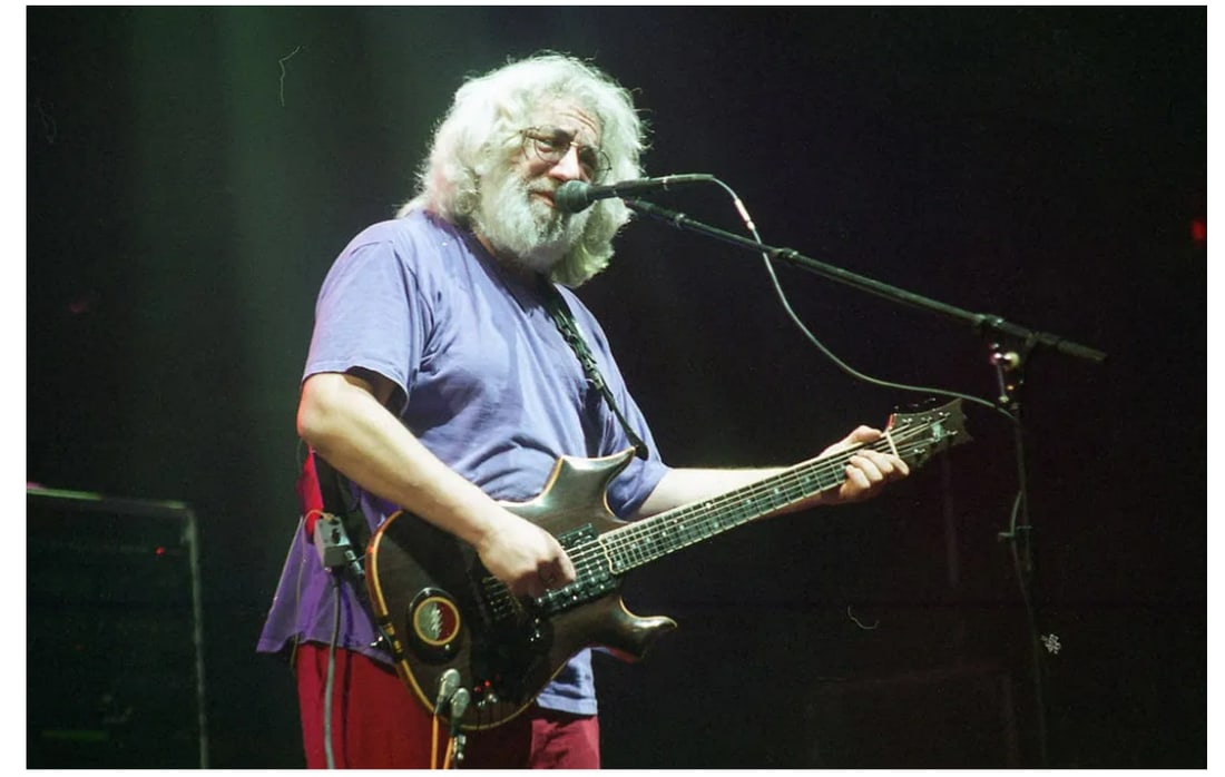 Jerry Garcia Grateful Dead Ebet Roberts Photo Negative: This lot features an original photographic negative of Jerry Garcia, taken by Ebet Roberts during a live performance with the Grateful Dead at RFK Stadium in Washington, D.C. in 1995. The image shows 