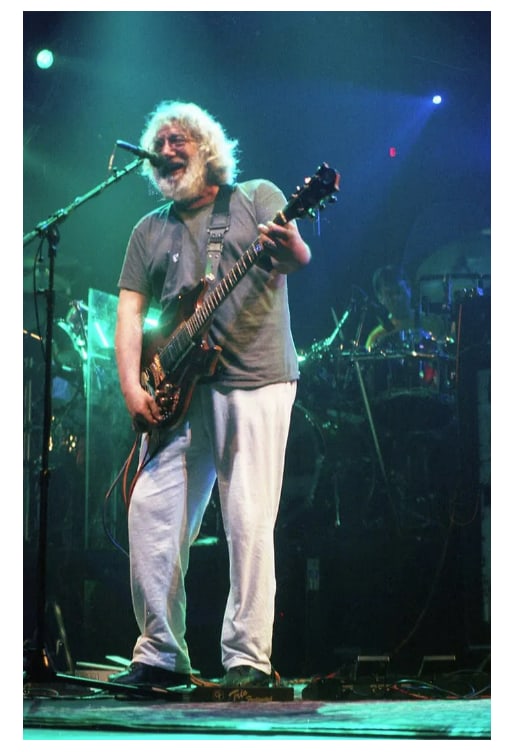 Jerry Garcia Grateful Dead Original Ebet Roberts Photo Negative: This lot features an original photographic negative of Jerry Garcia, taken by Ebet Roberts during a live performance with the Grateful Dead at the Knickerbocker Arena in Albany, New York in 1995. Robe