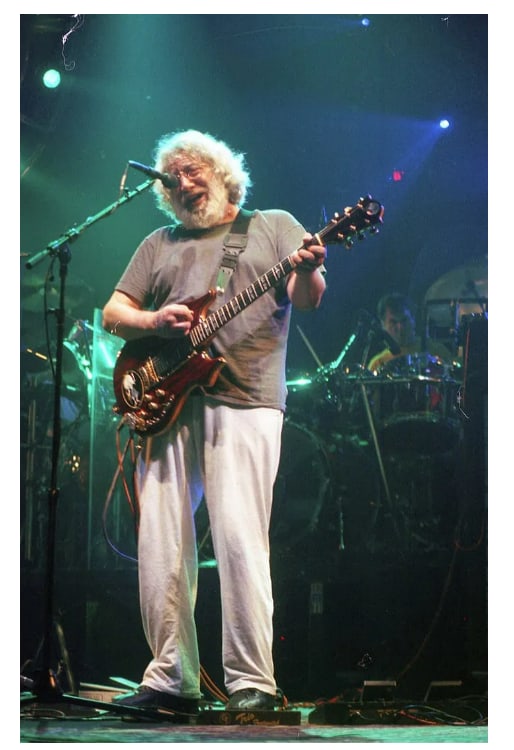 Jerry Garcia Grateful Dead Original Ebet Roberts Photo Negative: This lot features an original photographic negative of Jerry Garcia, taken by Ebet Roberts during a live performance with the Grateful Dead at the Knickerbocker Arena in Albany, New York in 1995. Robe