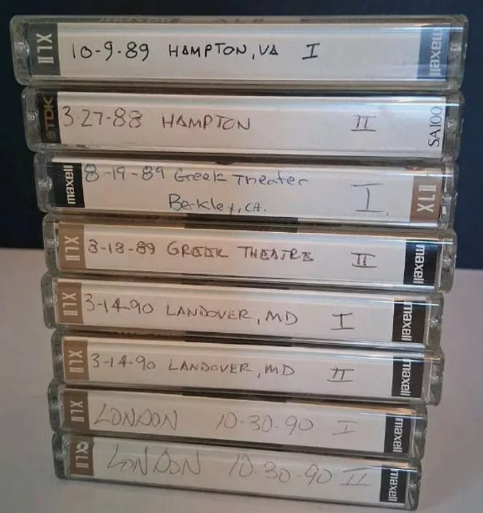 Grateful Dead Concert Bootleg Tape Lot: This lot features a curated collection of vintage Grateful Dead concert bootleg tapes, offering a rare opportunity for collectors and "Deadheads" to own a piece of live music history. Spanning