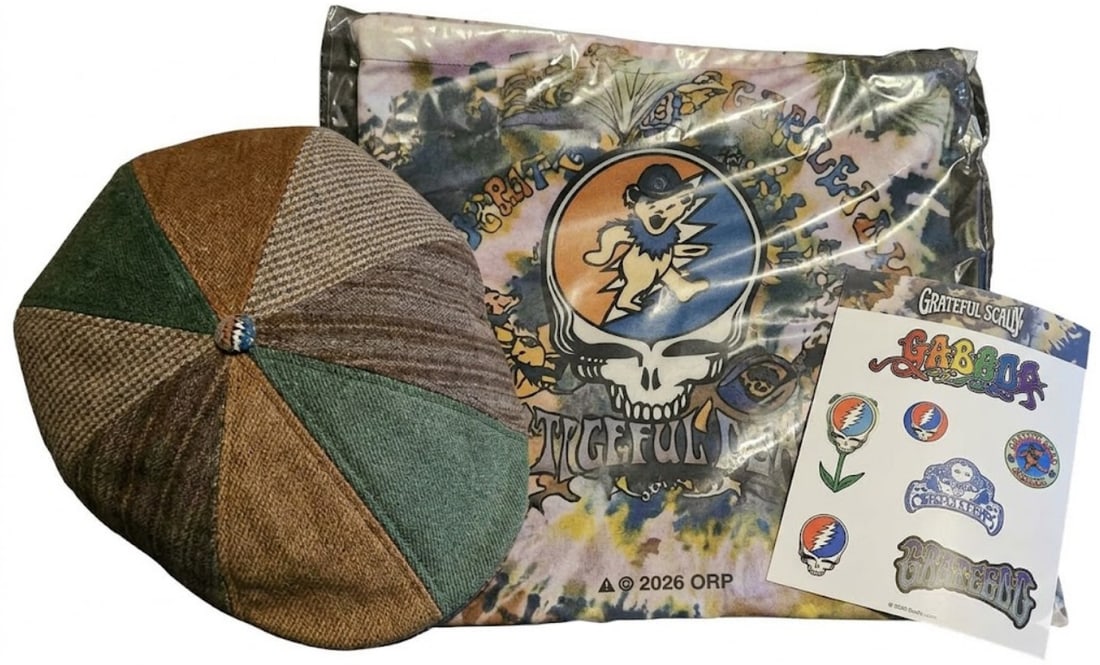 Grateful Dead Truckin Cap: Vintage trucker-style cap featuring imagery associated with Grateful Dead, reflecting classic fan merchandise and touring culture.