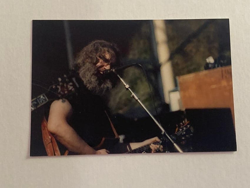 Grateful Dead Original Jerry Garcia Photo: Original photograph featuring Jerry Garcia, capturing the iconic musician in a candid or performance setting with strong visual appeal.