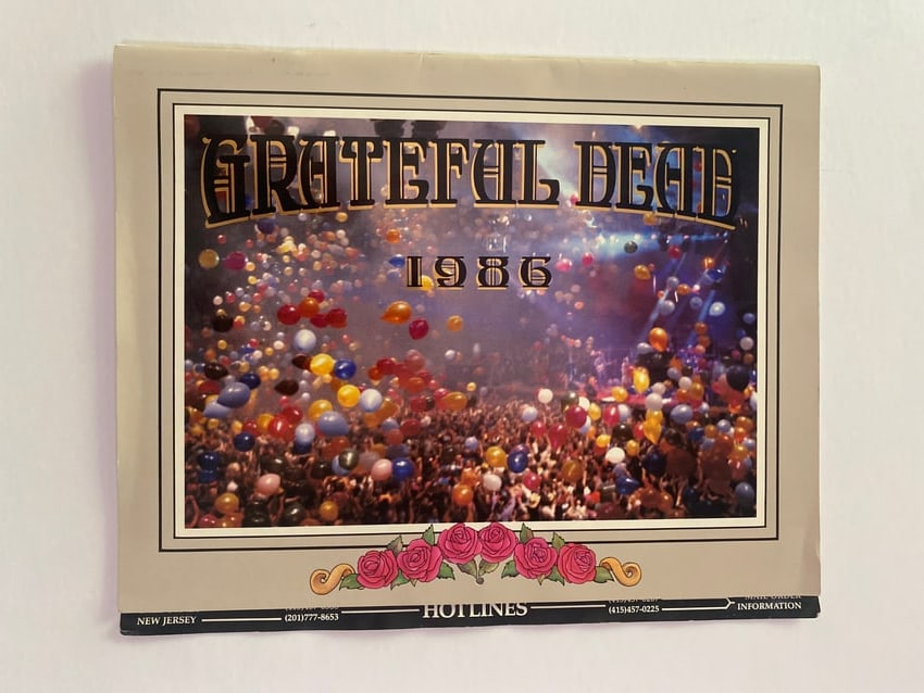 Grateful Dead 1986 New Years Concert Calander: 1986 New Year’s concert postcard associated with Grateful Dead holiday performances and fan memorabilia.