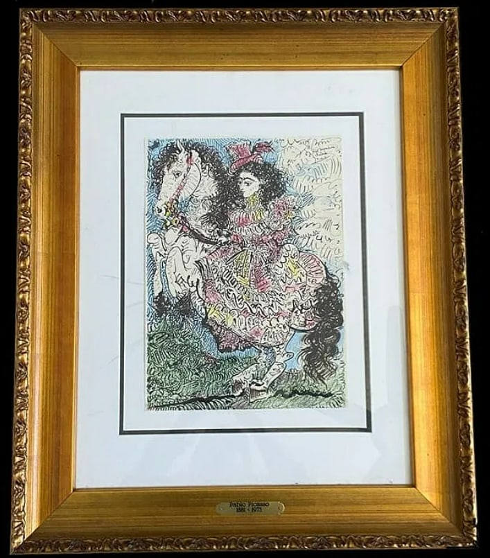 Pablo Picasso 1961 Pour Jacqueline Reine Lithograph: Dedicated to his last wife and muse, Jacqueline Roque, this 1961 lithograph titled Pour Jacqueline Reine is a tender and expressive work. It utilizes a poetic, simplified style to honor the woman who 