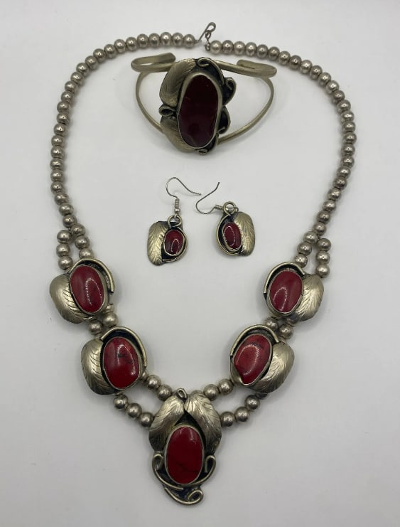 Navajo Native American Early 2oth Century Mexican Silver Jewelry: Navajo Native American Early 20th Century Mexican Silver Jewelry Set including necklace, bracelet, and matching earrings with red cabochon stones in hand-crafted silver settings. Traditional