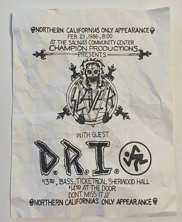 Slayer DRI Salinas Ca Cocnert Flyer: This lot features an original concert flyer promoting a performance by thrash metal pioneers Slayer and crossover hardcore legends D.R.I. (Dirty Rotten Imbeciles) in Salinas, California. Concert flyer