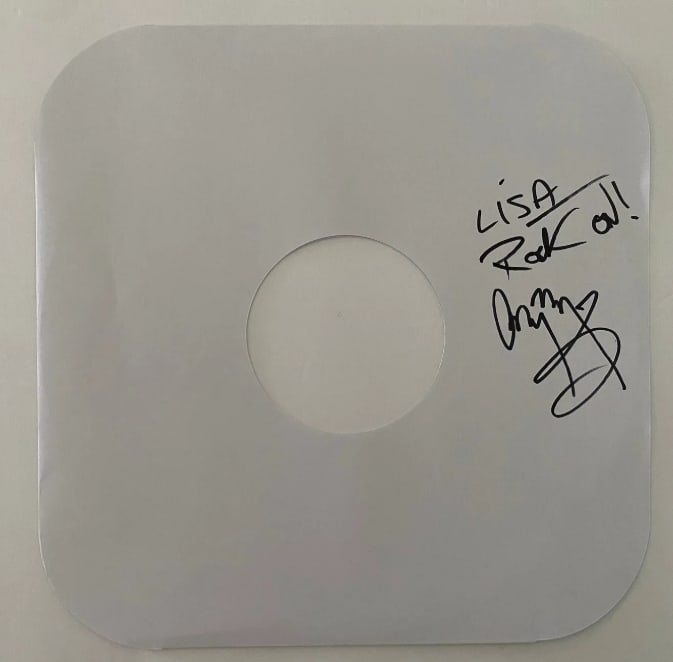 Jimmy Page Autographed Album Sleeve: Own a piece of rock history with this album sleeve personally autographed by legendary Led Zeppelin guitarist Jimmy Page. Featuring Page's highly sought-after signature, this collectible comes