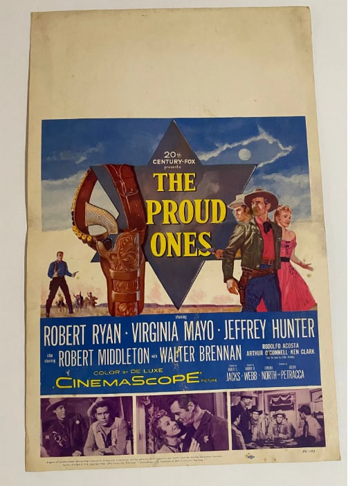 The Proud Ones Western Movie Lobby Card Poster: Released in 1956, *The Proud Ones* is a Western film directed by Robert D. Webb and starring Robert Ryan, Virginia Mayo, and Jeffrey Hunter. This lot features an original theatrical lobby card issued