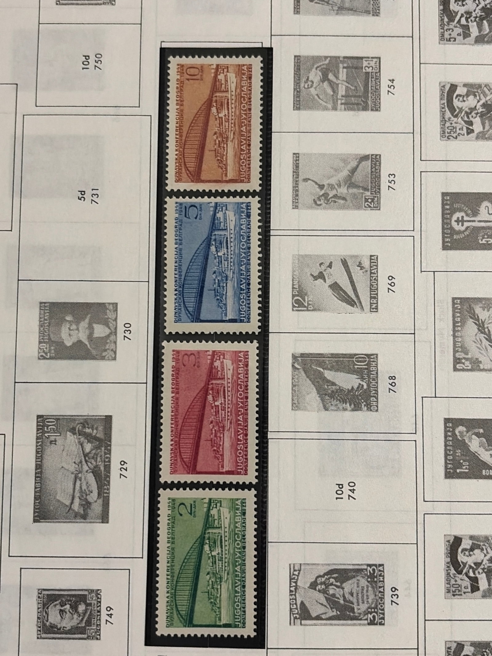 1948 Yugoslavia Danube Conference Belgrade Complete Four-Stamp Set: Complete four-stamp Yugoslavia issue commemorating the 1948 Danube Conference in Belgrade. The matching designs depict the Belgrade waterfront and bridge in 2-dinar green, 3-dinar rose, 5-dinar blue a