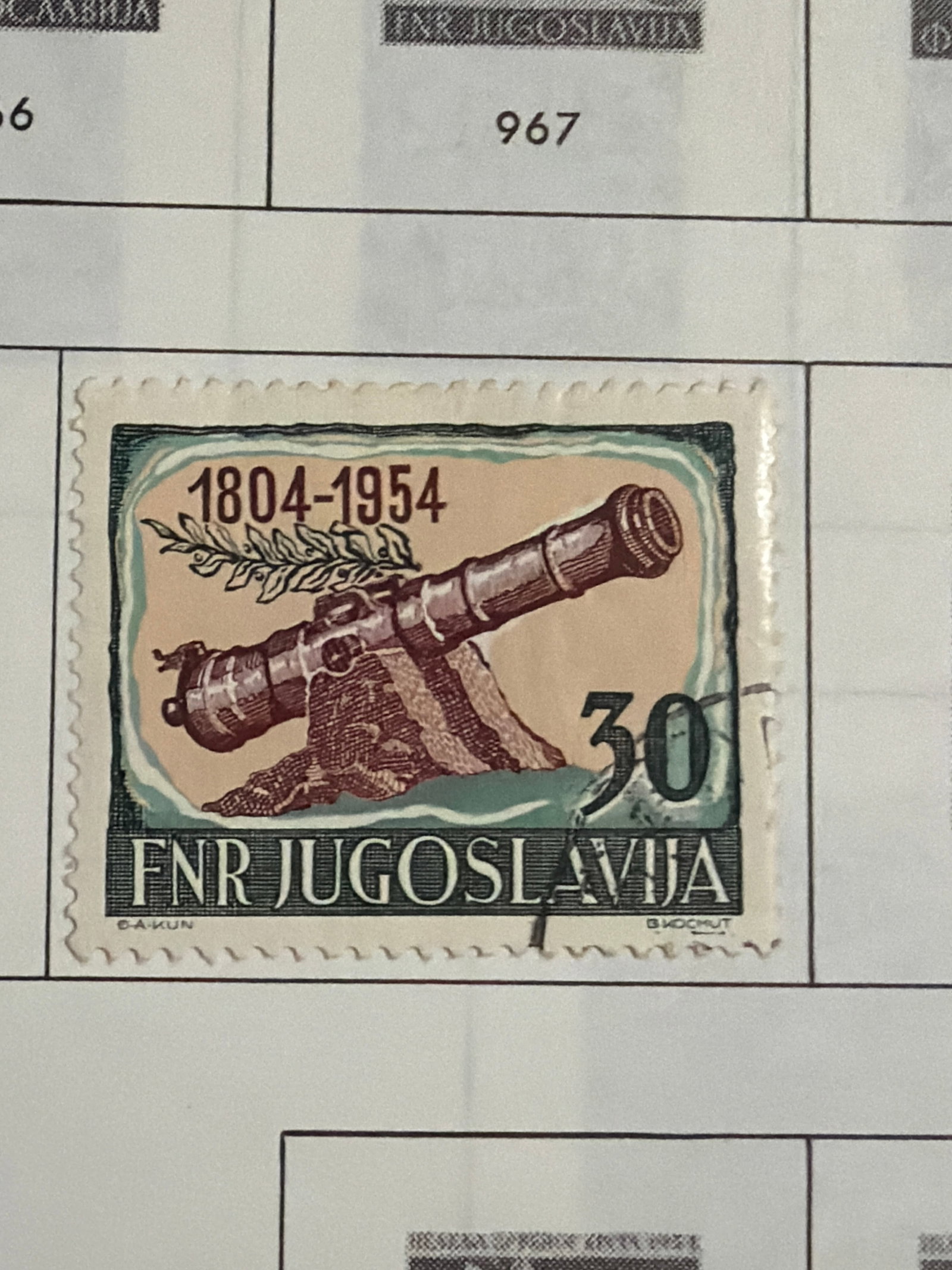 1954 Yugoslavia First Serbian Uprising 30-Dinar Cannon Stamp: Single 1954 Yugoslavia 30-dinar commemorative marking the 150th anniversary of the First Serbian Uprising, dated 1804-1954. The multicolor design depicts a historic cannon decorated with a laurel bran