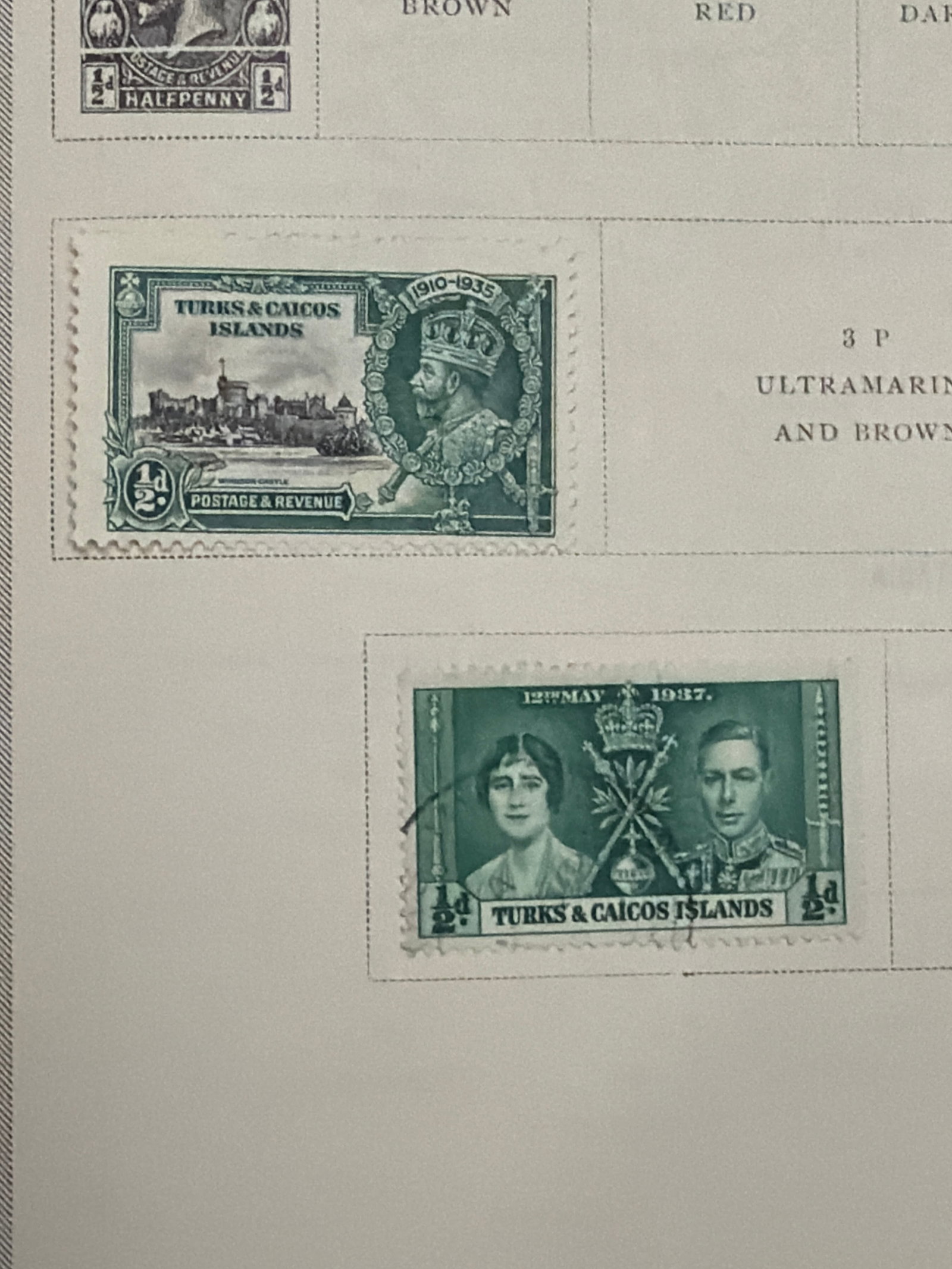 1935-1937 Turks and Caicos Islands Royal Commemorative Stamp Pair: Pair of Turks and Caicos Islands half-penny stamps comprising the 1910-1935 King George V Silver Jubilee issue depicting Windsor Castle and the 1937 Coronation issue featuring King George VI and Queen
