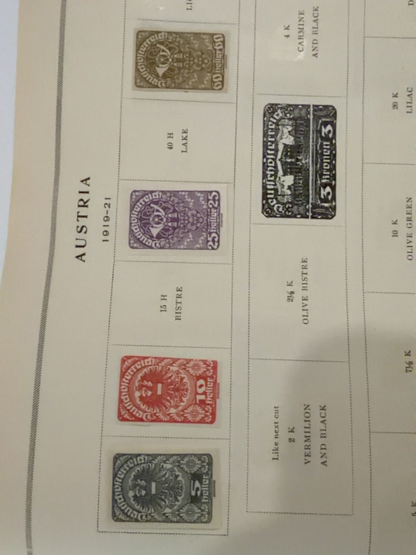 Austria 1919-1921 Coat of Arms Postage Stamp Group: Group of five Austrian postage stamps from the 1919?1921 period. Includes imperial-eagle and architectural designs in assorted denominations and colors. Stamps are displayed on the original album