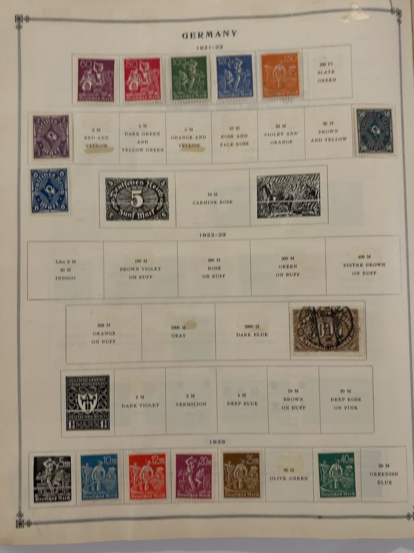 Germany 1923 Hyperinflation Surcharged Stamp Collection Page: Album page containing approximately 18 German hyperinflation stamps with denominations ranging from hundreds to hundreds of thousands of marks. Includes numerous bold Tausend surcharge overprints in a