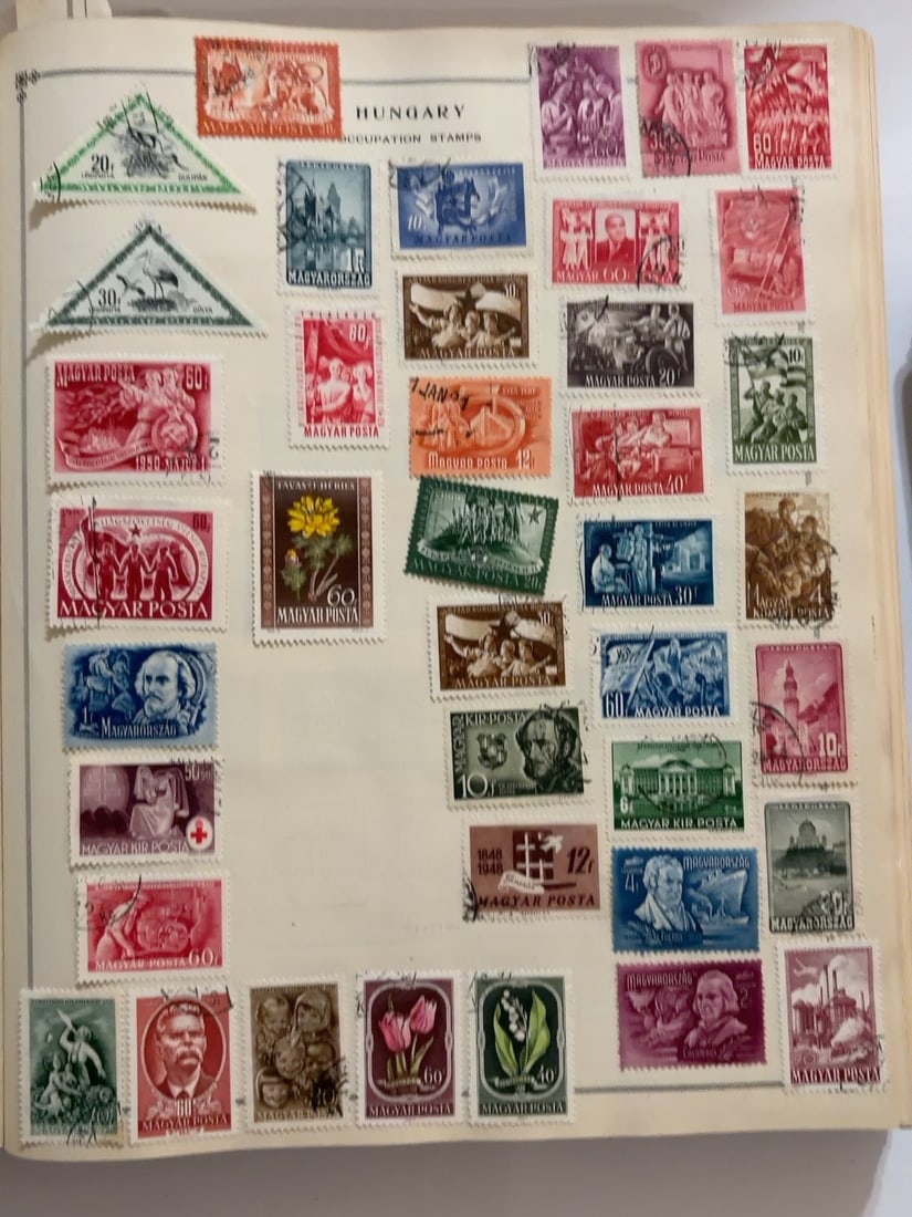 Hungary Mid-20th Century Commemorative Stamp Collection: Substantial mixed collection of Hungarian postage and occupation-era stamps featuring agriculture, flowers, buildings, portraits, Red Cross and other commemorative subjects. Mounted on a partially fil