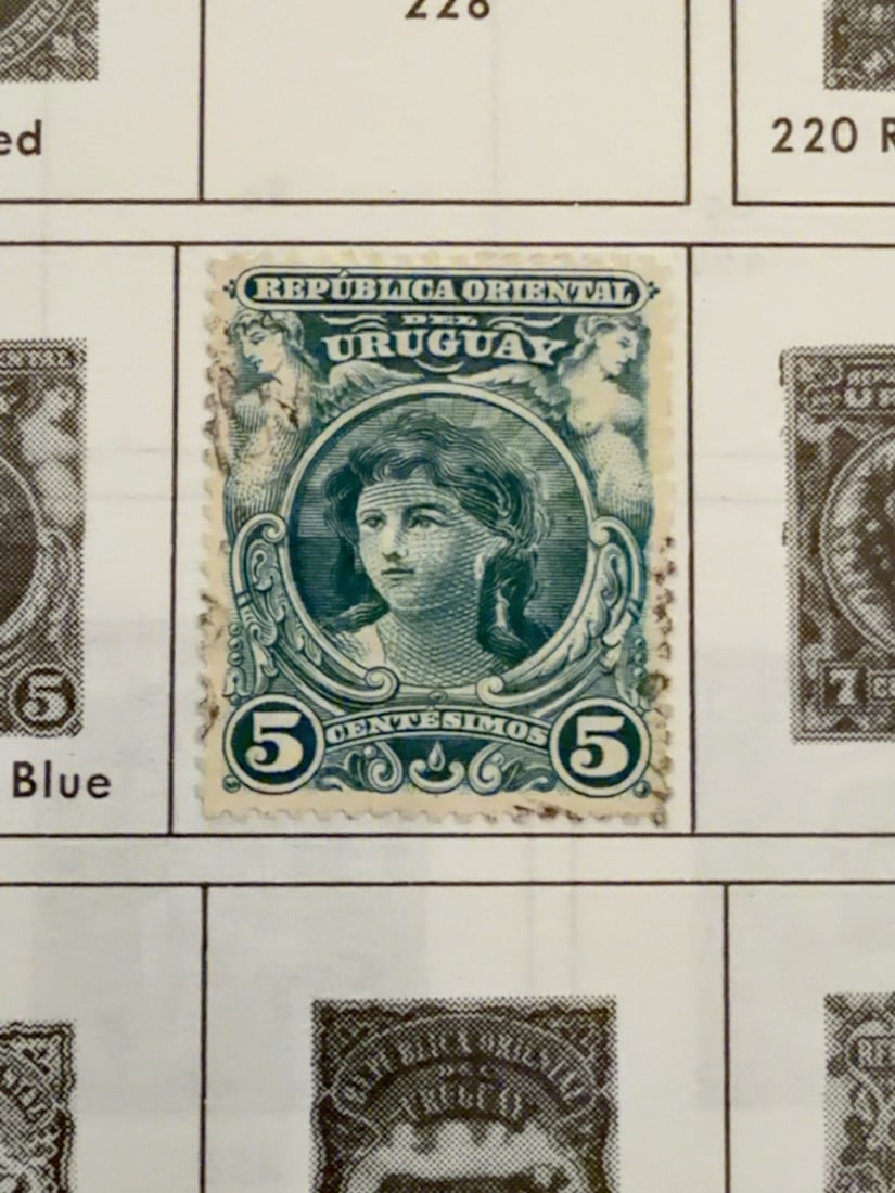 Uruguay Five-Centesimos Allegorical Portrait Stamp: Vintage Republica Oriental del Uruguay five-cent?simos green postage stamp featuring a female allegorical portrait within an ornate frame. Used example with cancellation, toning and edge wear;