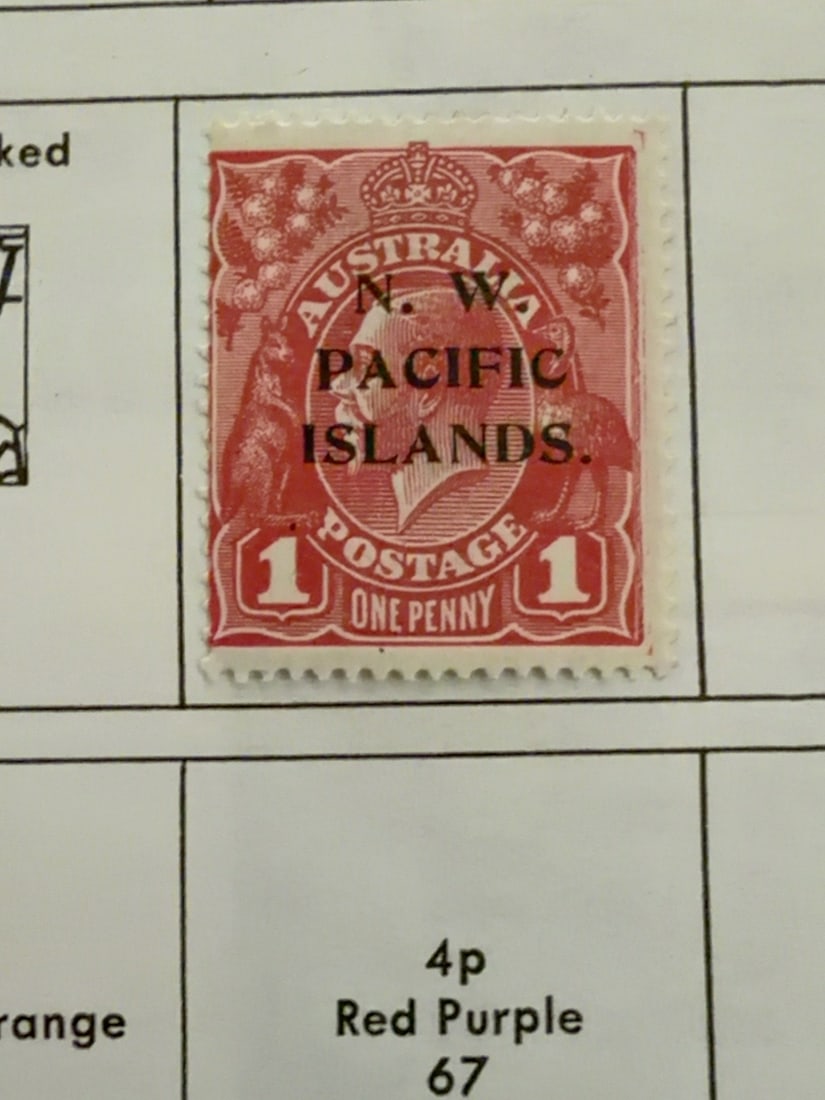 Australia N.W. Pacific Islands One-Penny Overprint Stamp: Vintage Australian King George V one-penny red postage stamp overprinted ?N.W. Pacific Islands.? Appears unused with perforated edges and light age toning; mounted on album paper with gum and hinging