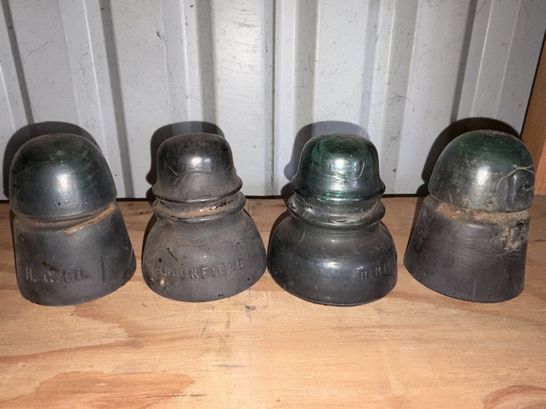 Antique Glass Utility Insulators Collection (4): Sold as shown.