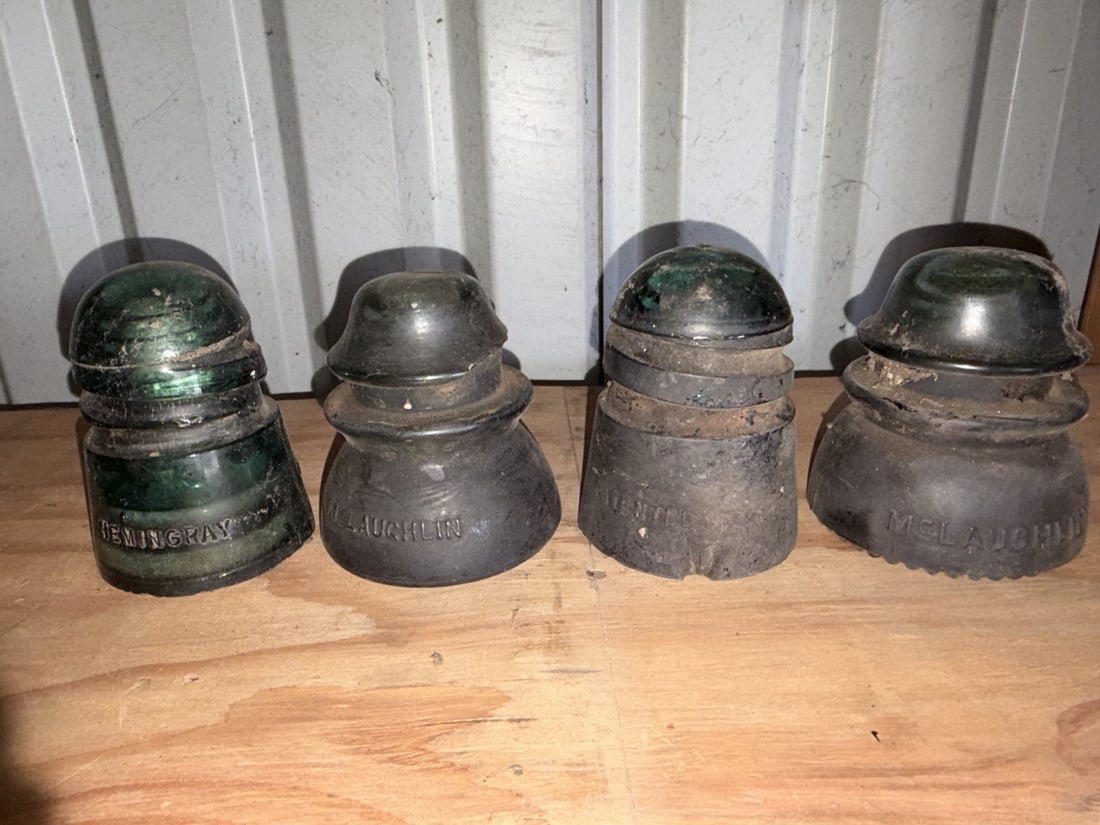 Antique Hemingray McLaughlin Glass Insulators (4): Sold as shown.