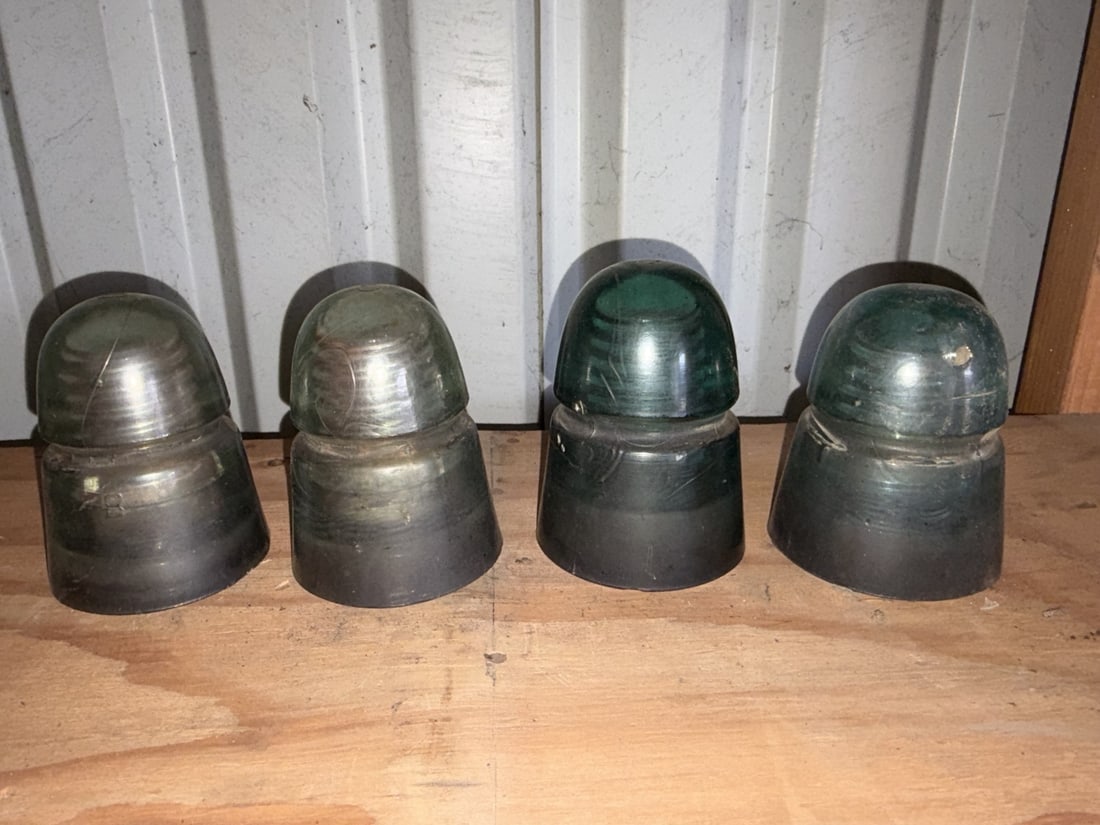 Antique Glass Utility Line Insulators (4): Sold as shown.