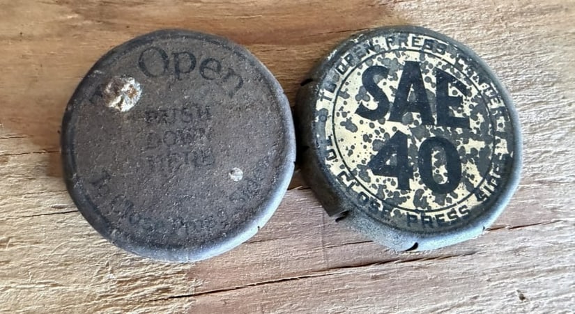 Vintage Automotive Oil & SAE 40 Advertising Can Lids: Sold together as shown.