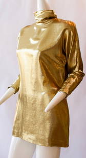 Pauline Trigere 1960s Thigh Length Gold Lame Button Up with Pleated Mock Collar: Pauline Trigere 1960s Thigh Length Gold Lame Button Up with Pleated Mock CollarFranco-American designer Pauline Trig?re was the daughter of a Parisian tailor and a dressmaker who developed technical s