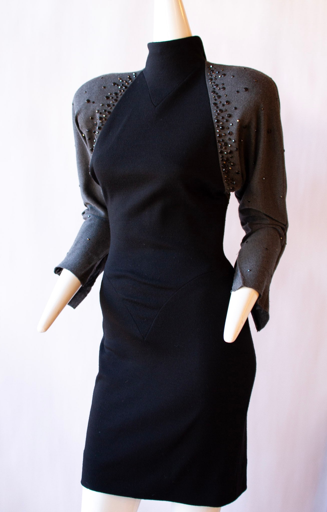 Bob Mackie Grey and Black Fitted Dress with Rhinestones on Back and Shoulders: Bob Mackie Grey and Black Fitted Dress with Rhinestones on Back and Shoulders1980s Bob Mackie, grey and black fitted dress with mock turtle neck and embellished with rhinestones on shoulders and back
