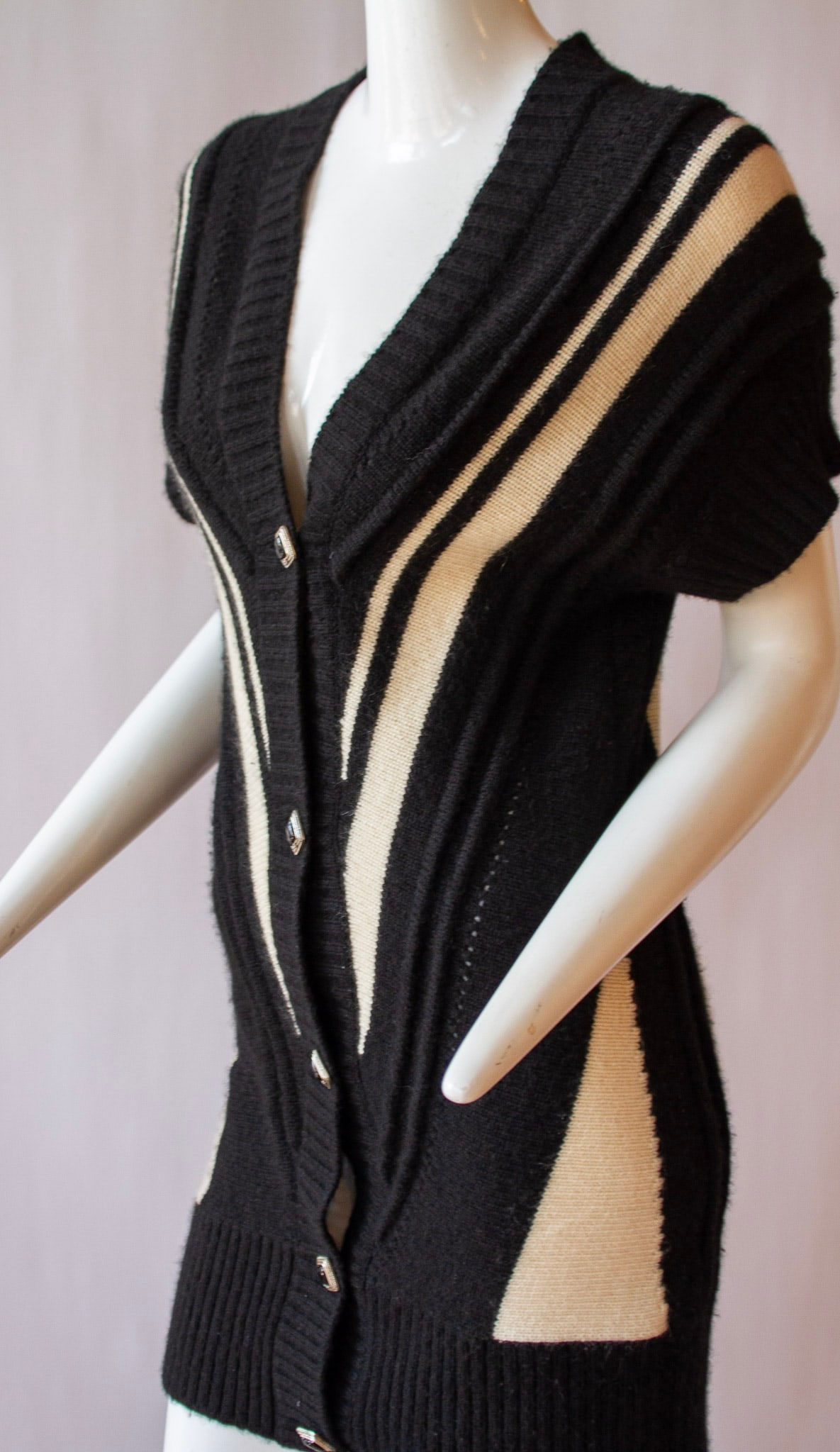 CHANEL, 2008 Autumn, Black and White Cardigan: CHANEL, Black and White Cashmere Cardigan with CC Logo Buttons, 2008 AutumnChanel, black and white cashmere and mohair knee length short-sleeve cardigan with Chanel logo square buttons, deep v-necklin