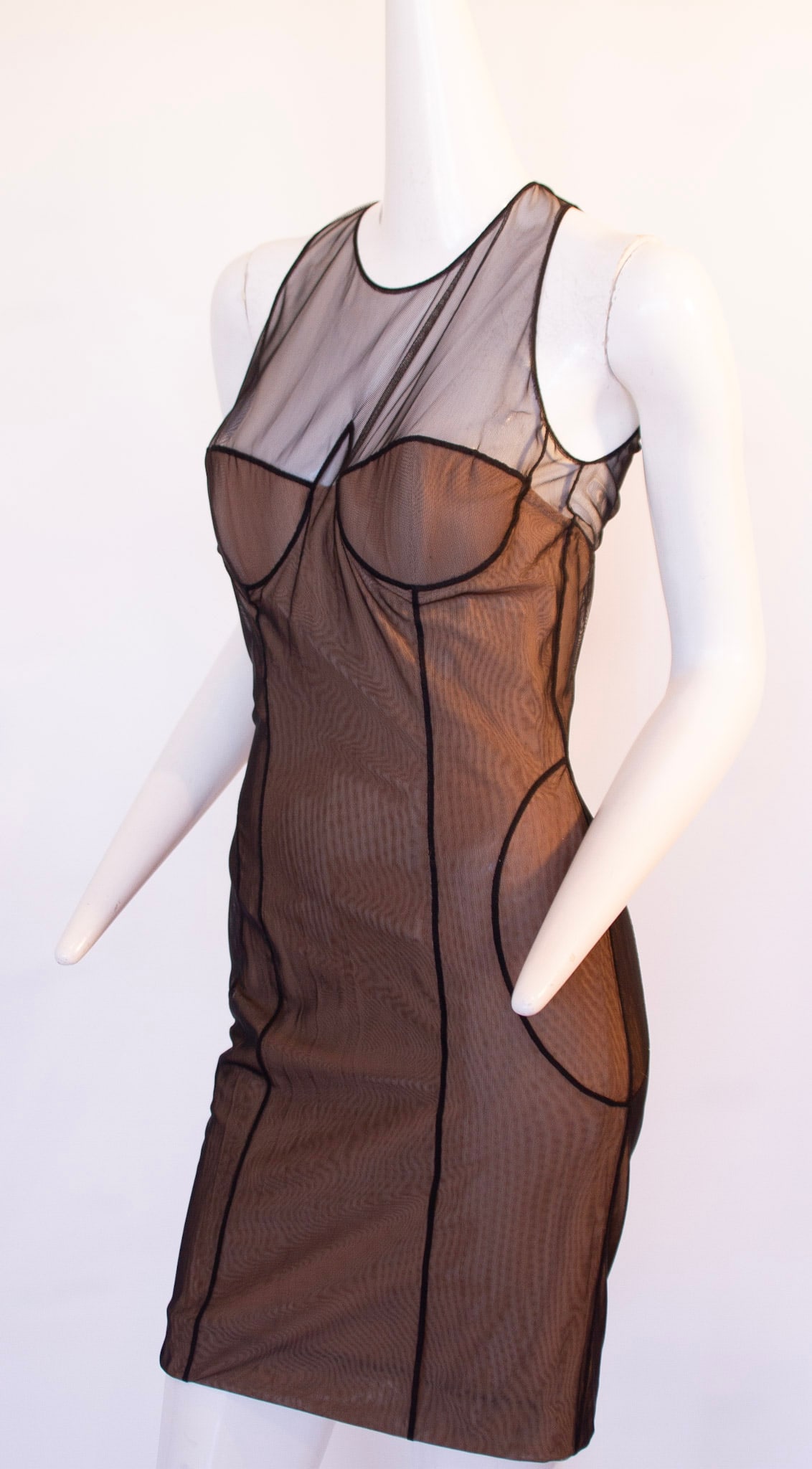 Gucci by Tom Ford Iconic Body-Con Dress Spring / Summer 2001, Made in Italy: Gucci by Tom Ford Iconic Body-Con Dress Spring / Summer 2001, Made in ItalyNude mesh strapless dress Bustier style top Black sheer tulle mesh overlay with high neckline Black sheer tulle mesh has seam