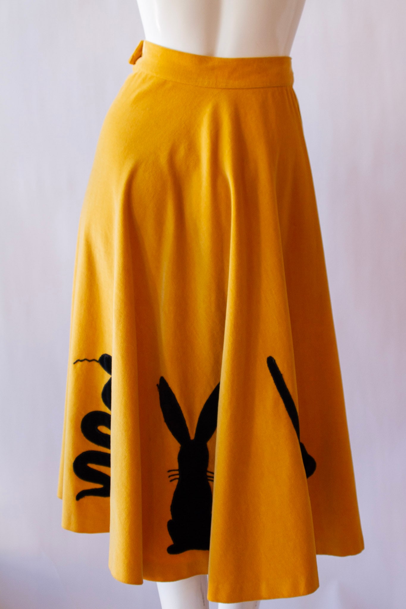 VERY VINTAGE Yellow Disco Skirt: VERY VINTAGE Yellow Disco Skirt Skirt is Hand-made, high-waisted, found in Spain. Black outlines of a snake, a rabbit, and a cat. Skirt : Waist 30" ; Length 32" ; Hem Opening 120" Women's Fashion and 