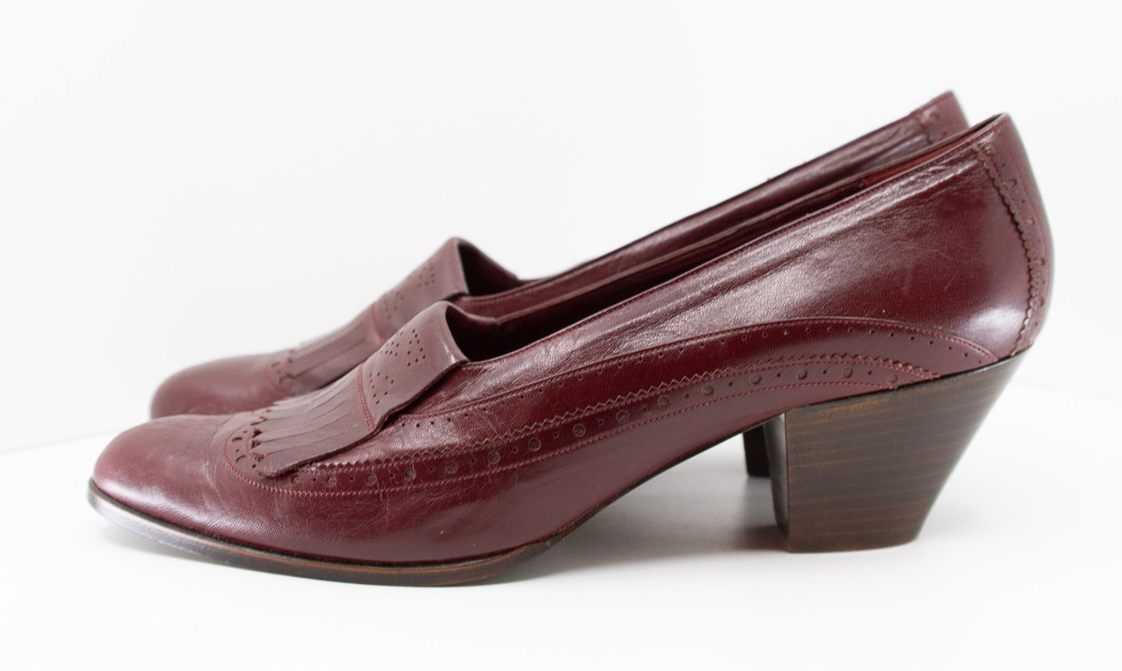 SUSAN BENNIS/ WARREN EDWARDS, Kilte Fringe Pumps, Oxblood Leather: SUSAN BENNIS/ WARREN EDWARDS, Kilte Fringe Pumps, Oxblood LeatherSusan Bennis/Warren Edwards shoes attracted everyone from Bruce Springsteen to Jacqueline Kennedy Onassis and shown at the Philadelphia