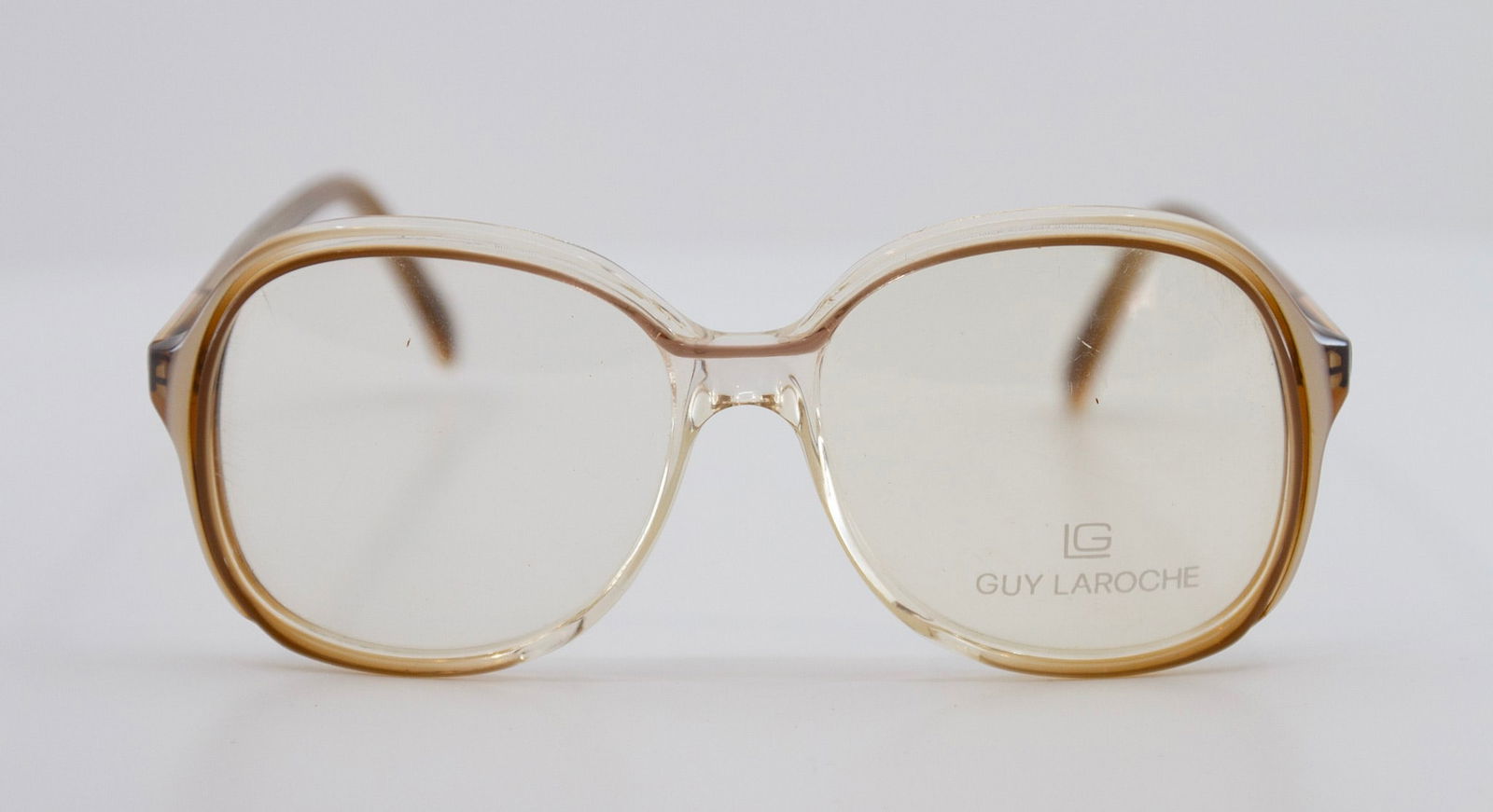 GUY LAROCHE 1970s Brown Ombre Glasses: GUY LAROCHE 1970s Brown Ombre GlassesGuy Laroche 1970s Brown Ombre GlassesLength 12.5 ; Height 5cm ; Bridge 1.5" ; Arm 14cm NO RESERVE