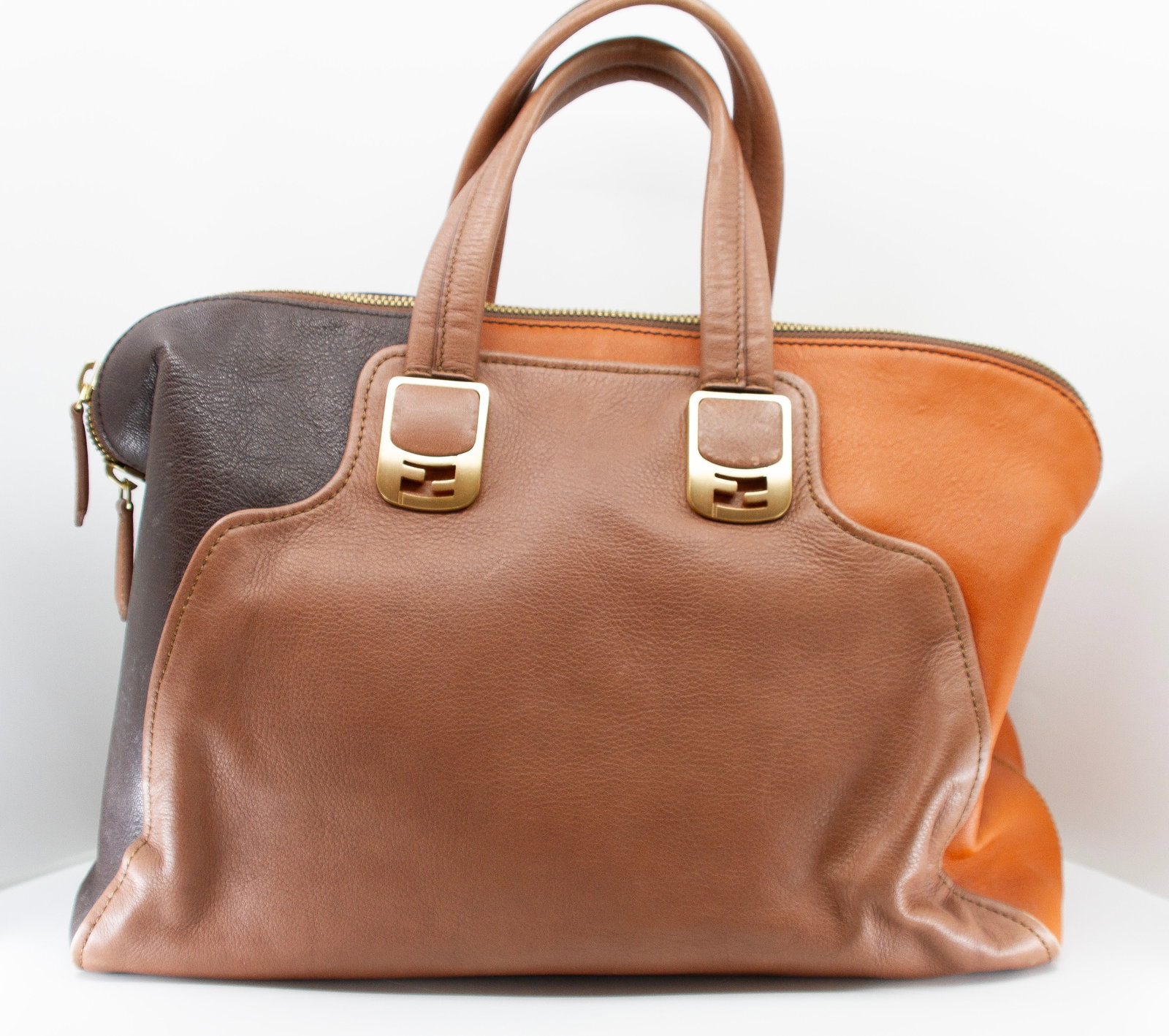 FENDI Black/Brown/Camel Colorblock Calfskin Chameleon Satchel: FENDI Chameleon Satchel Black/brown/camel colorblock calfskin with tonal topstitching and golden hardware. Length 15" ; Height 10" ; Depth 7" ; Shoulder Drop 5"