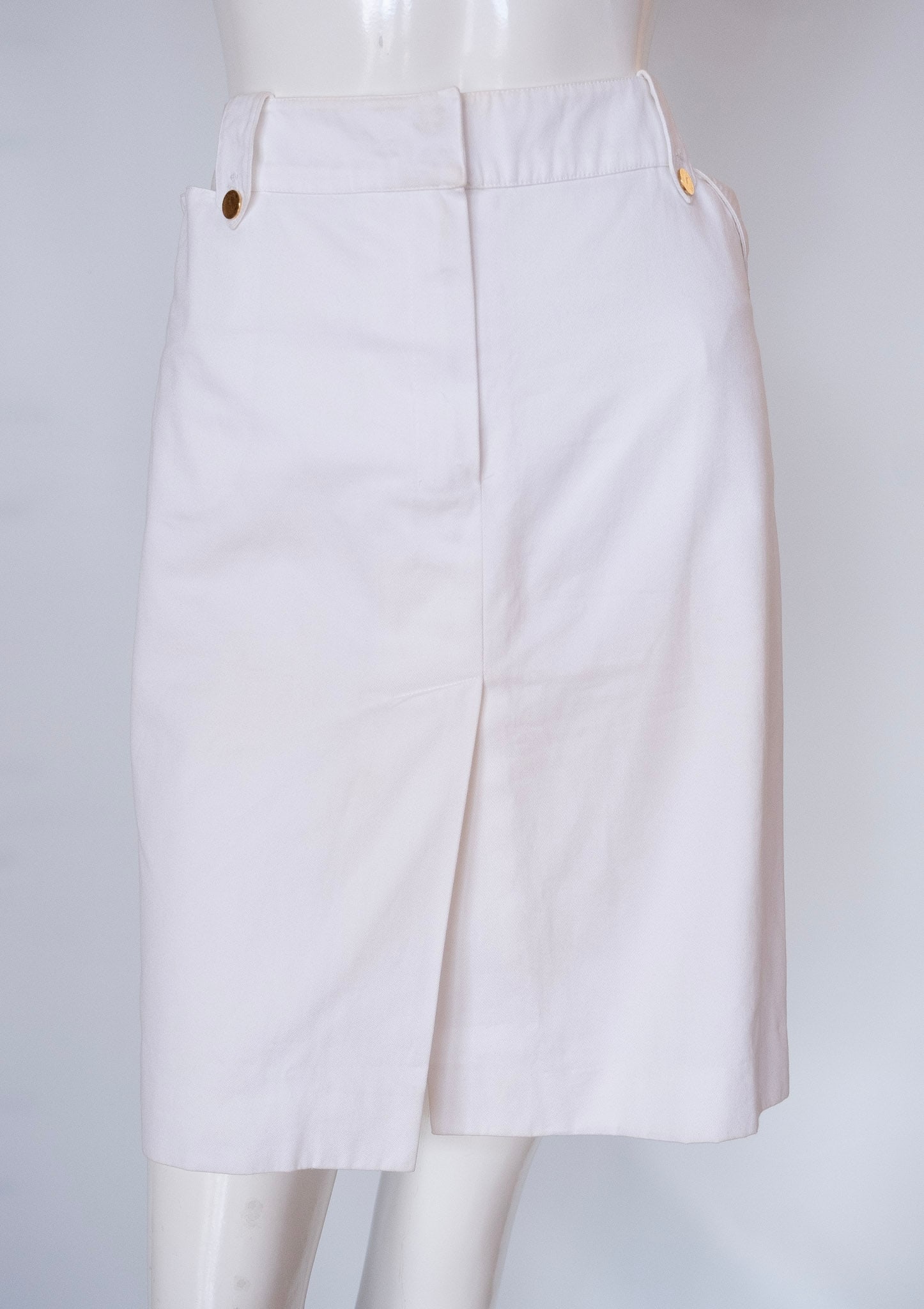 YVES SAINT LAURENT White Denim Skirt: Yves Saint Laurent white skirt EU 42, Waist 34" ; Length 23" ; Hem Opening 40"