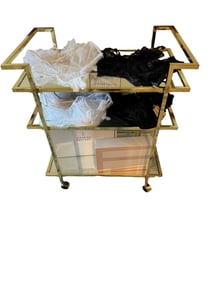 Mirrored gold tone bar cart