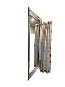 Tall silver beveled mirror