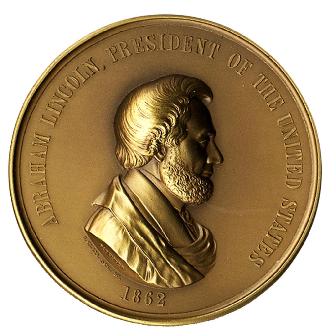 Lincoln Restruck Peace Medal: Restruck Peace Medal, on the face, 1862, left profile, “Abraham Lincoln, President of the United States”. Reverse shows the plowing scene surround by two Indians. Fine